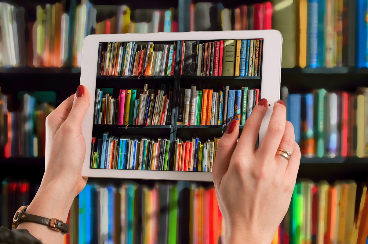 Tablet and bookshelf picture- decorative use only